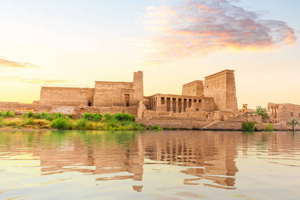 Temple of Isis on Philae Island at sunset, view from the Nile, Aswan, Egypt.